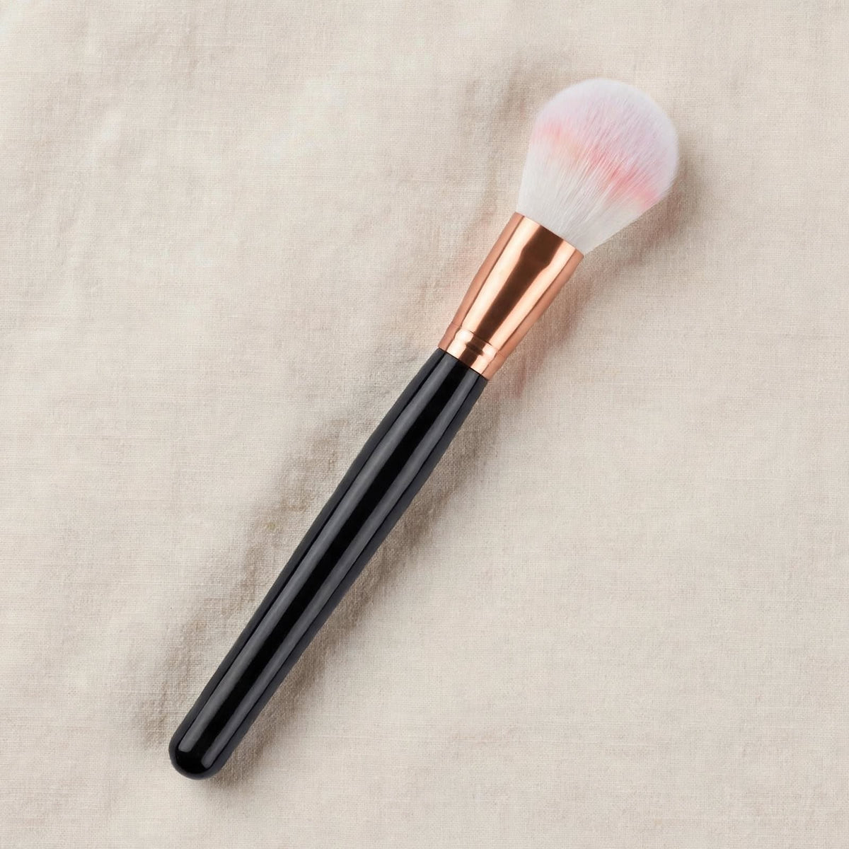 Black handle powder brush, angled