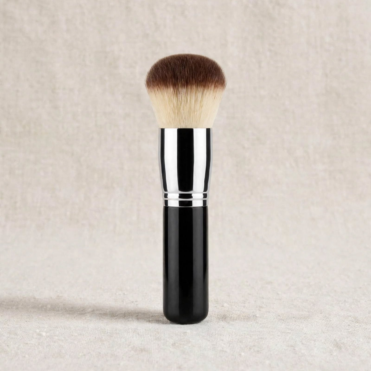 Black kabuki buffing brush standing