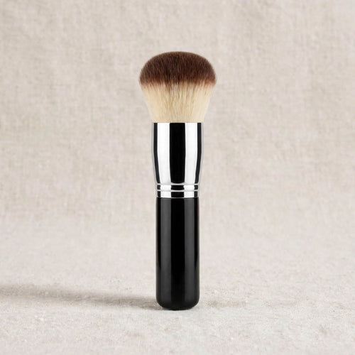 Black kabuki buffing brush standing