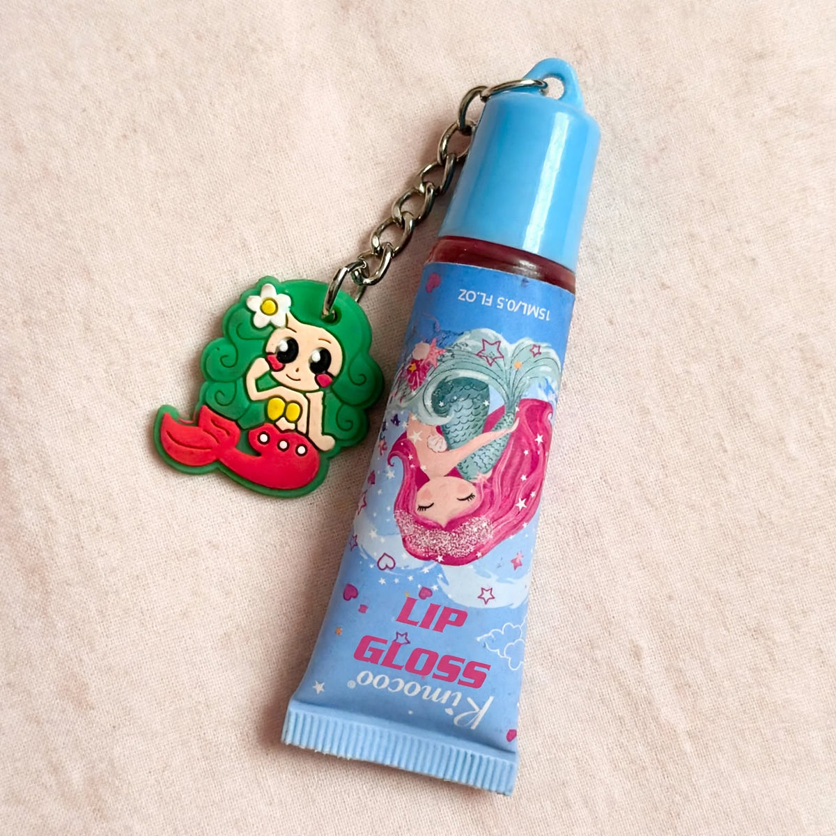 Rimocoo mermaid lip gloss with keychain, close up