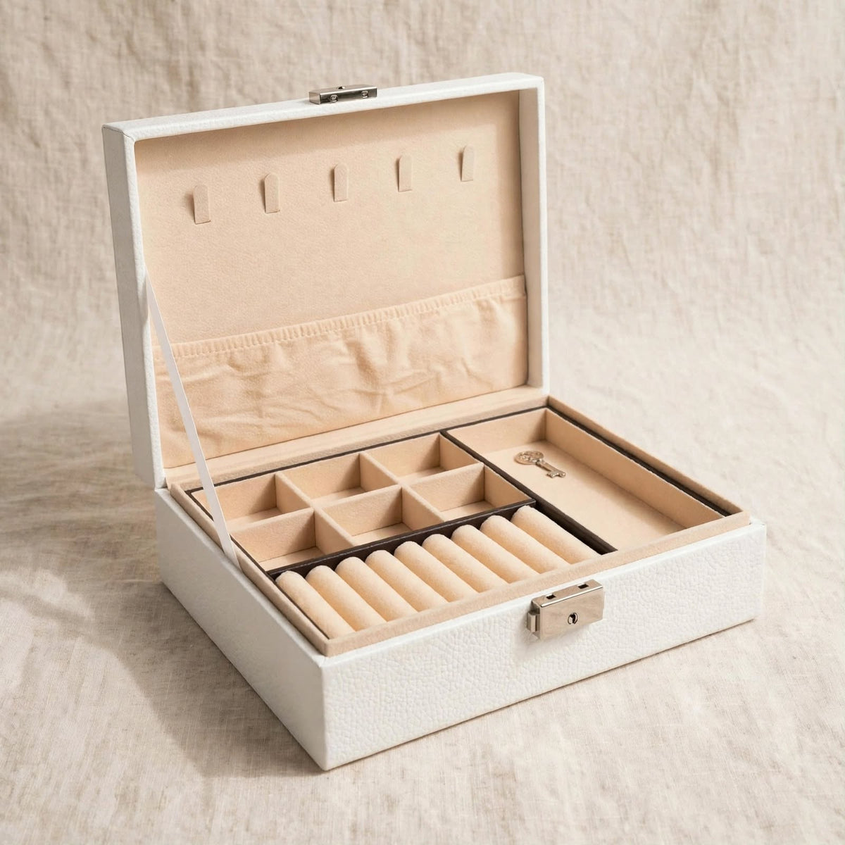 White jewellery box, open and empty