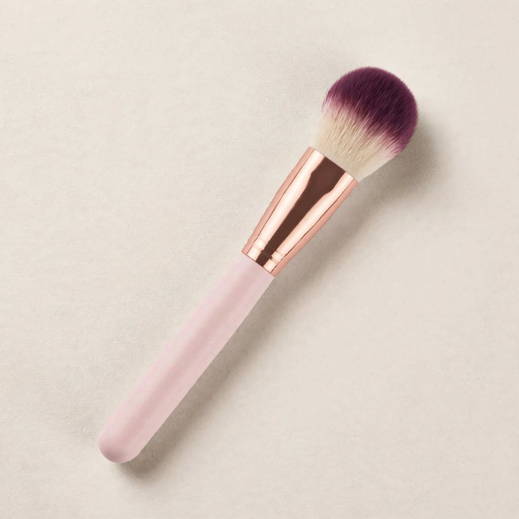 Purple tip blush brush with pink handle
