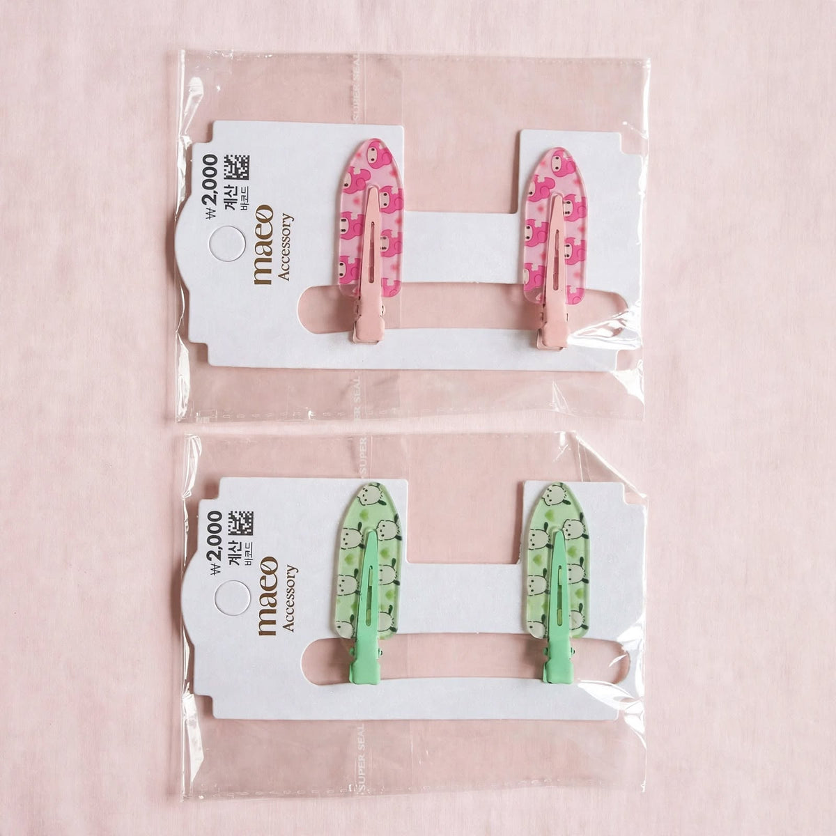 Printed snap hair clips in pink and green