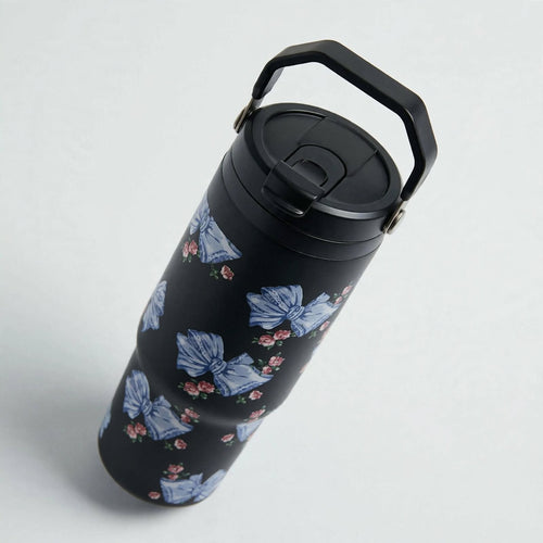 Black ribbon coquette travel tumbler, angled
