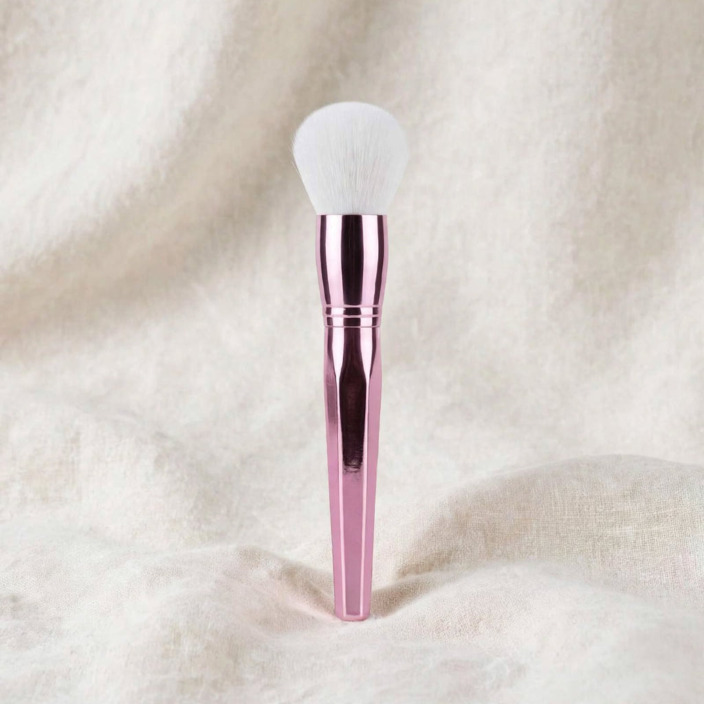 Rose pink fluffy powder brush standing