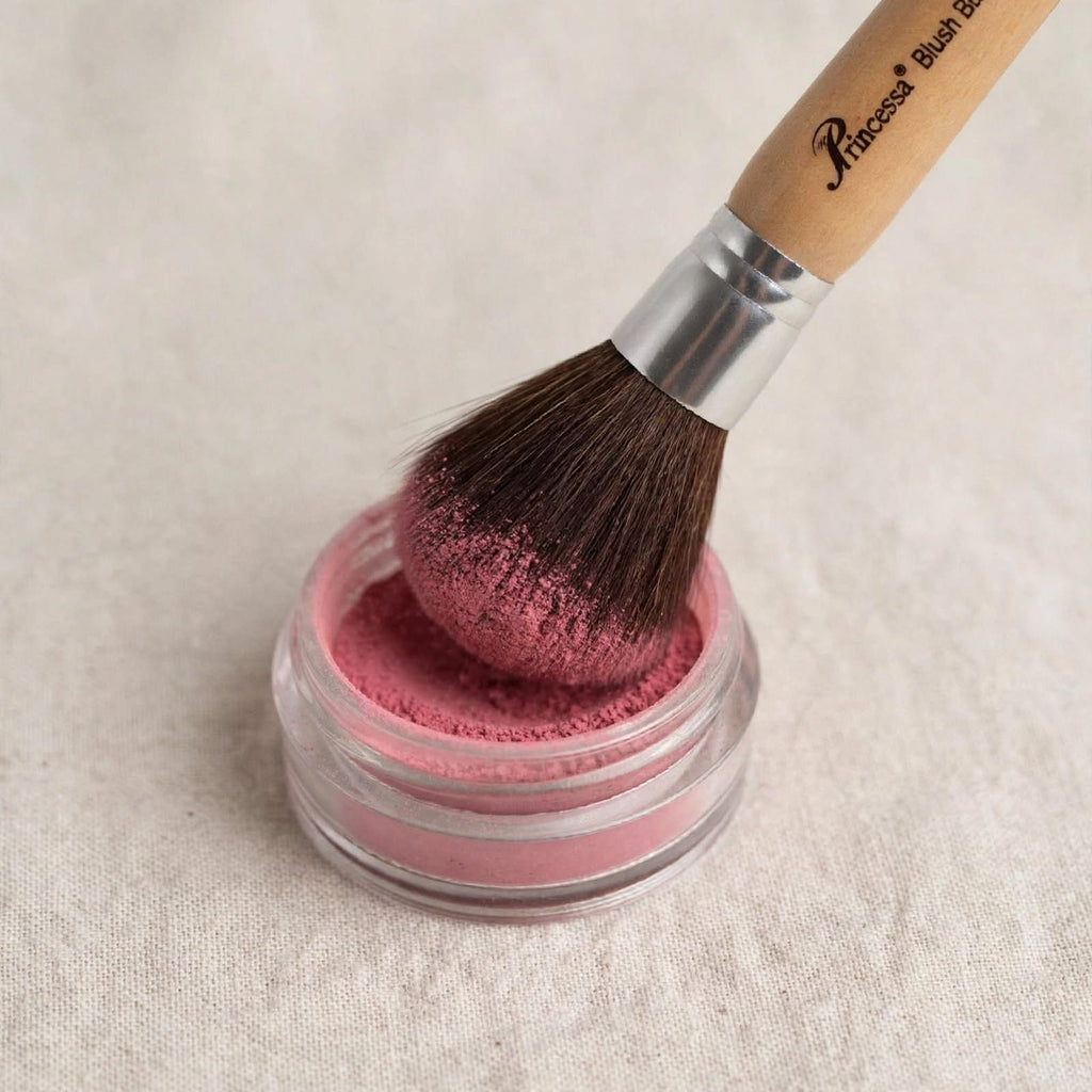 Precious powder brush with blush, close up