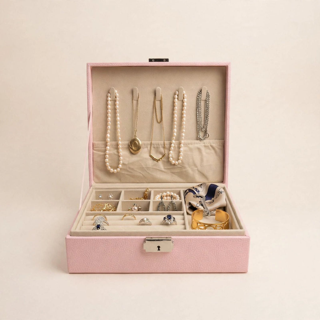 Pink jewellery box with necklaces and rings