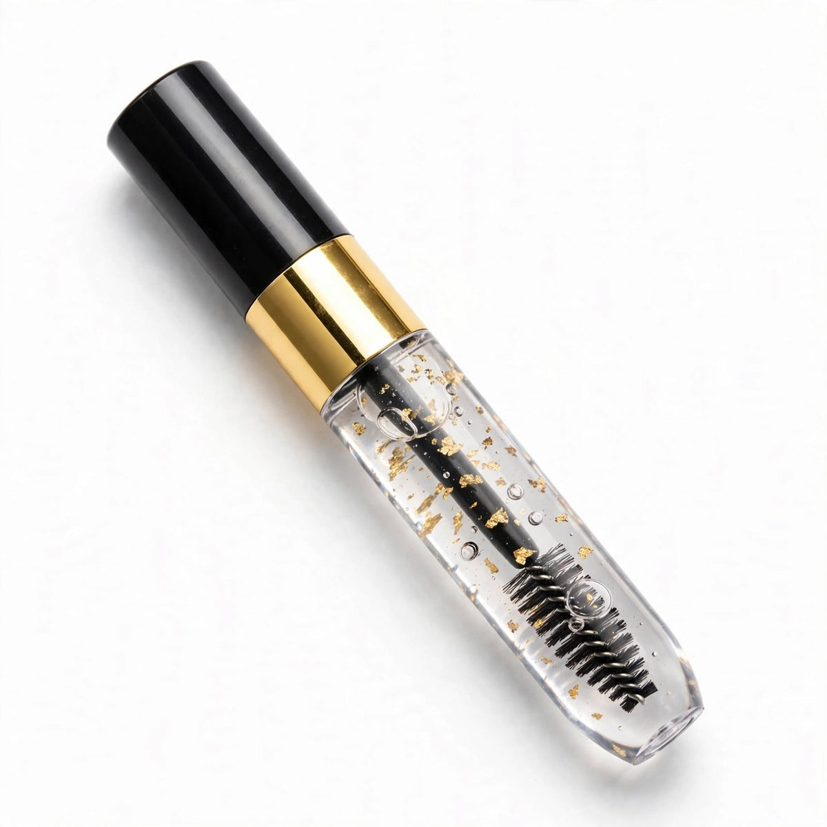 Clear brow and lash gel tube with gold flakes