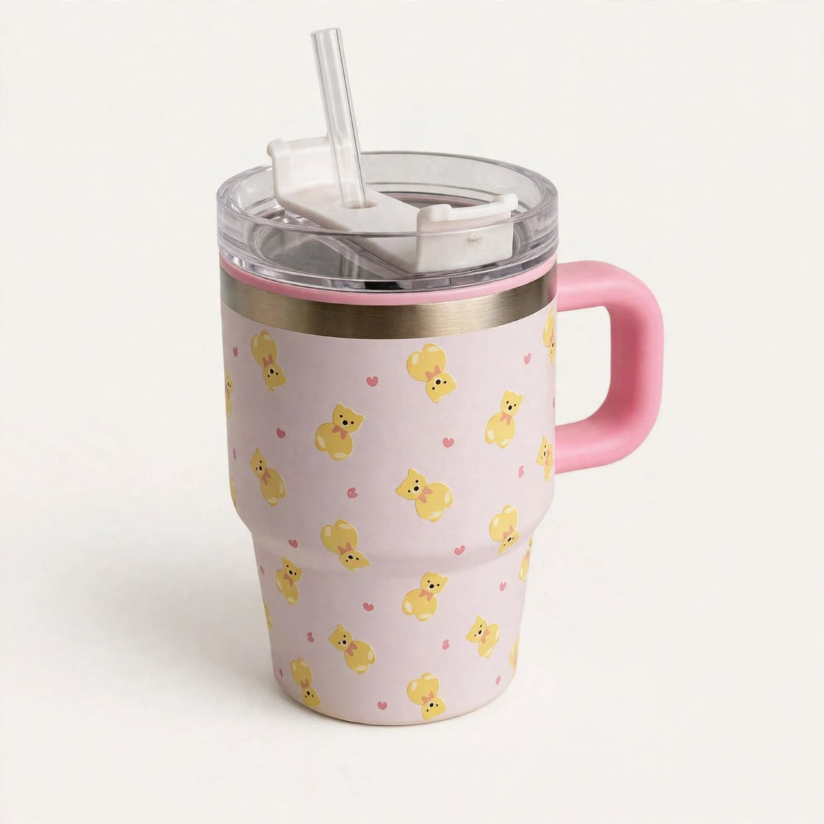Beige floral 600ml tumbler with pink handle